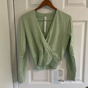 Lululemon green knit sweater. Worn once for an interview. Size 4.